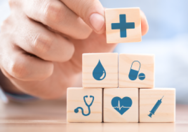building blocks with health icons