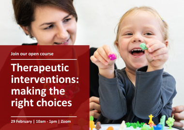 child playing with small toys whilst woman is assessing