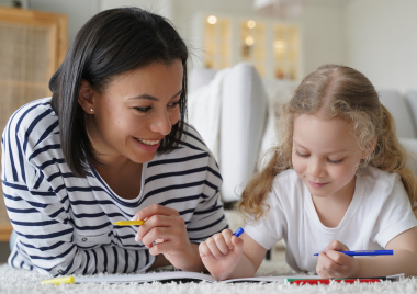 Kinship carer and child drawing