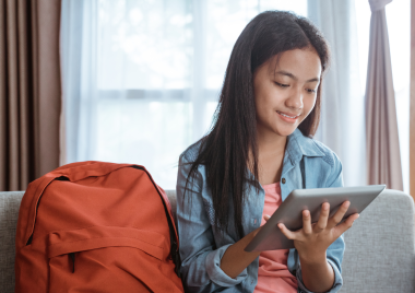 Teenager using tablet