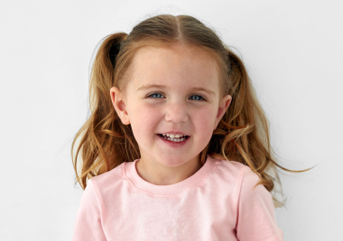 young girl smiling