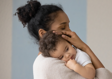 woman holding a baby