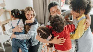 Parents/Carers hugging children