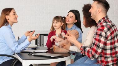 Adoptive family with a social worker