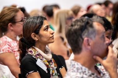 audience of social workers sat listening 