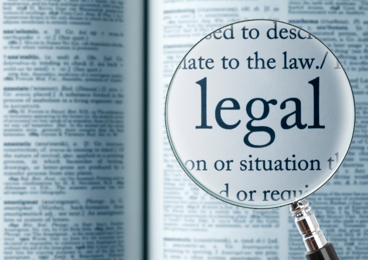 Magnifying glass highlighting the word legal