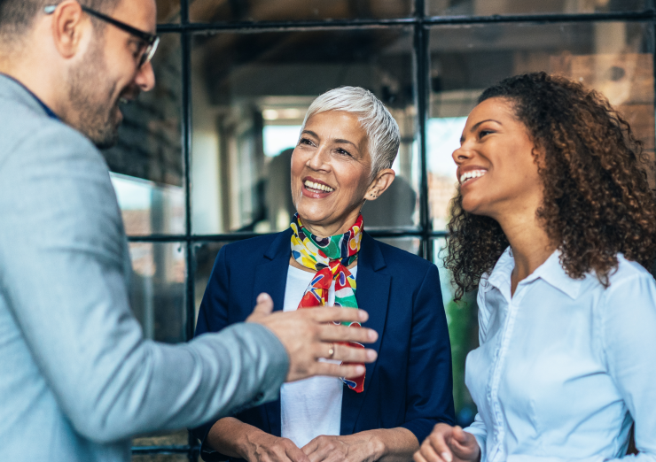 three people talking
